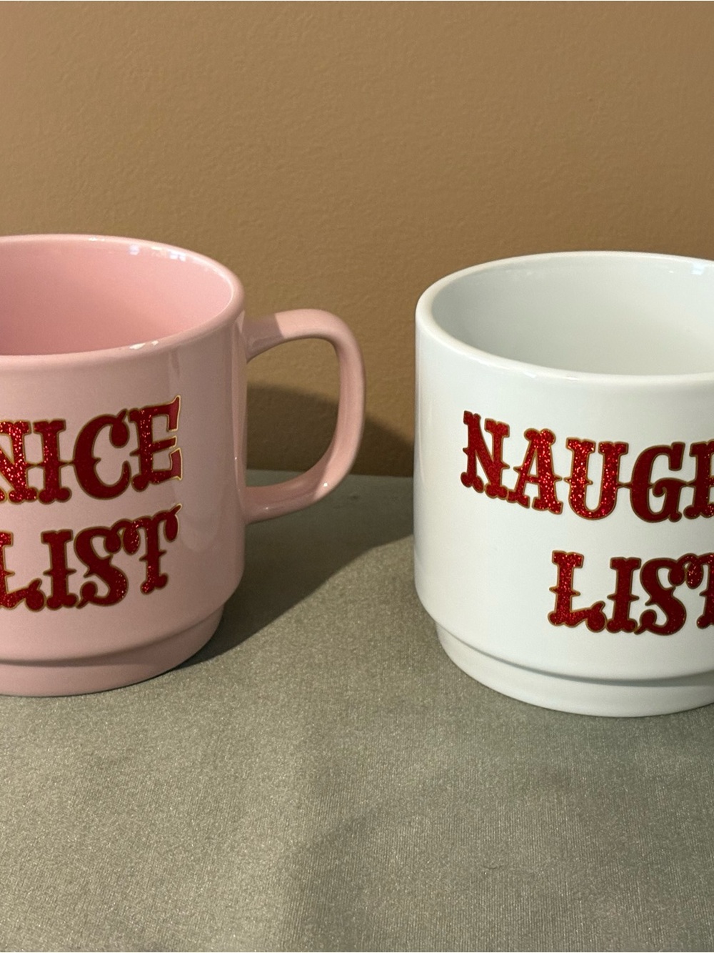 Festive Pink and White 'Nice' and 'Naughty' Holiday Mugs